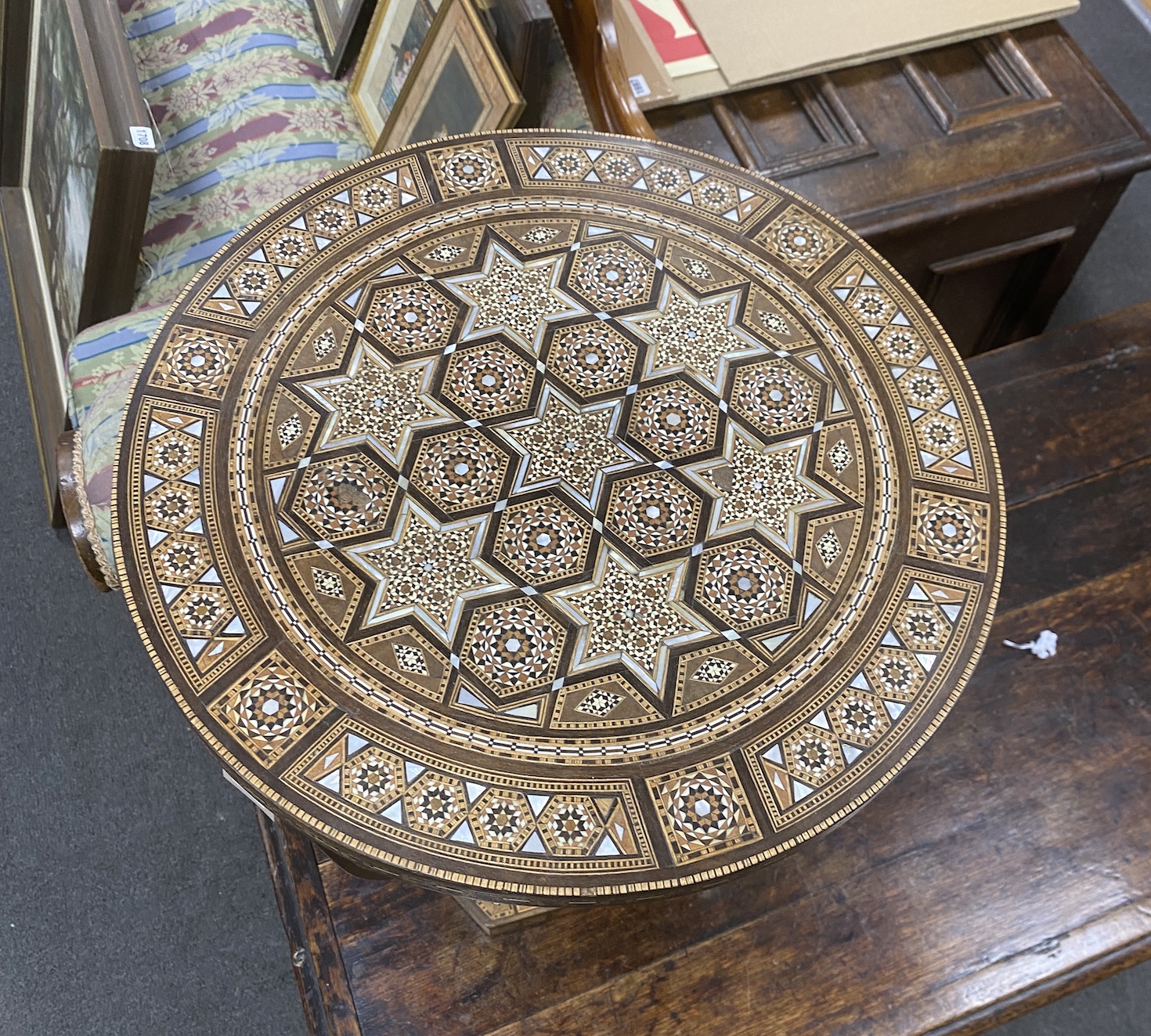 A circular Moorish inlaid occasional table, diameter 41cm, height 52cm